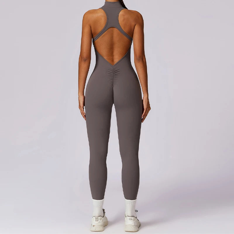 KiKis v back one-piece yoga suit in gray with open back design and fitted legs