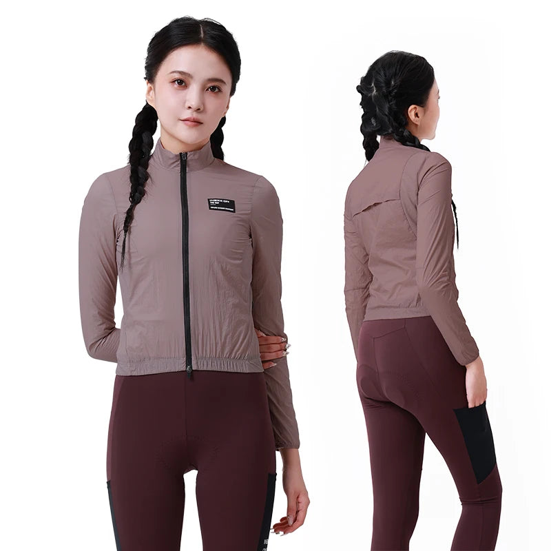 KiKis women's cycling windbreaker in muted mauve worn by model showing front and back views