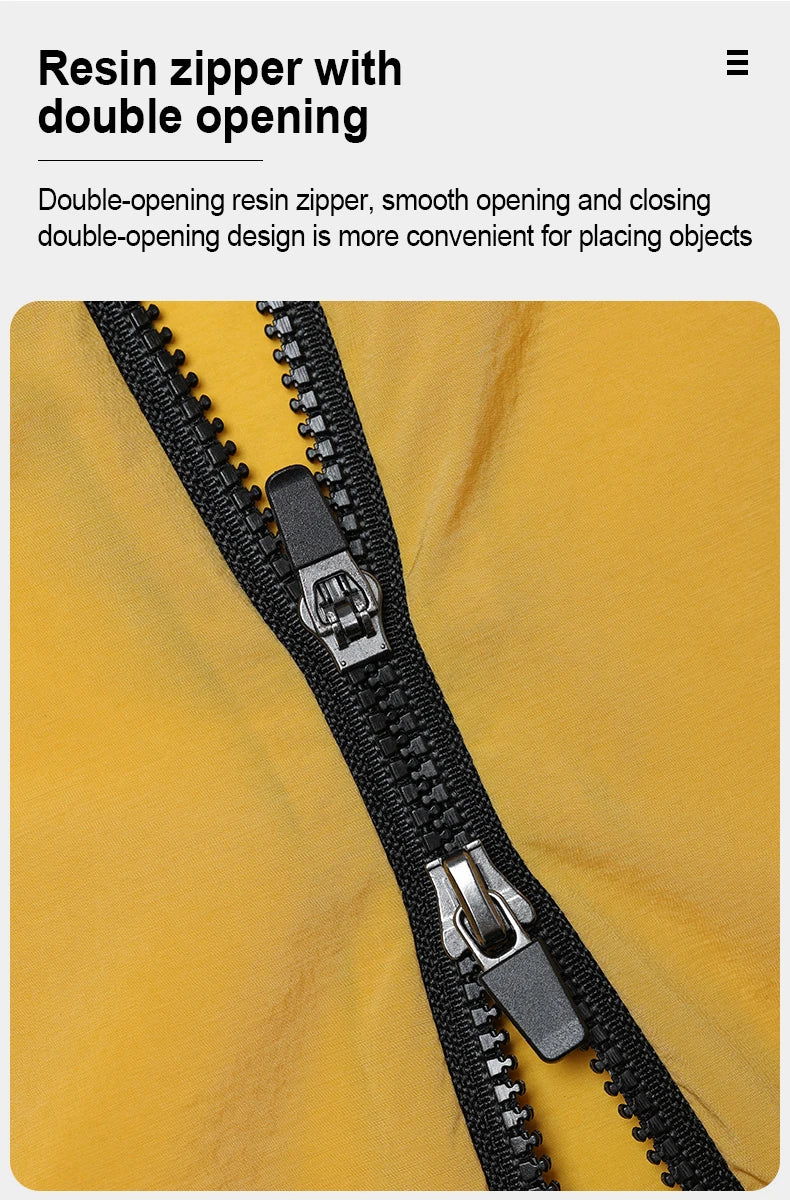 Close-up of double-opening resin zipper on yellow women's cycling windbreaker by KiKis