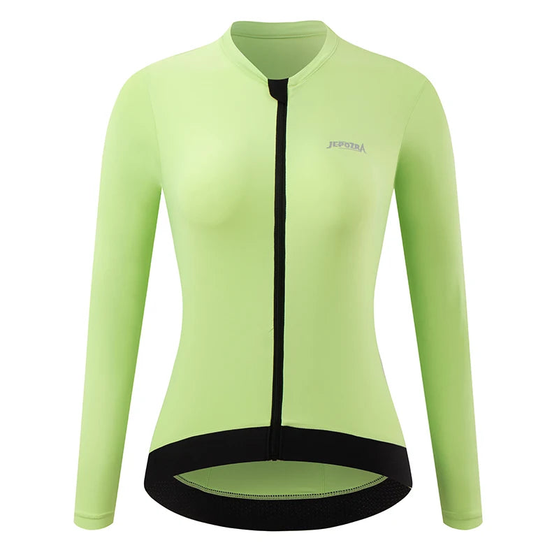 KiKis women's long sleeve cycling jersey in light green with black zipper and hem detailing