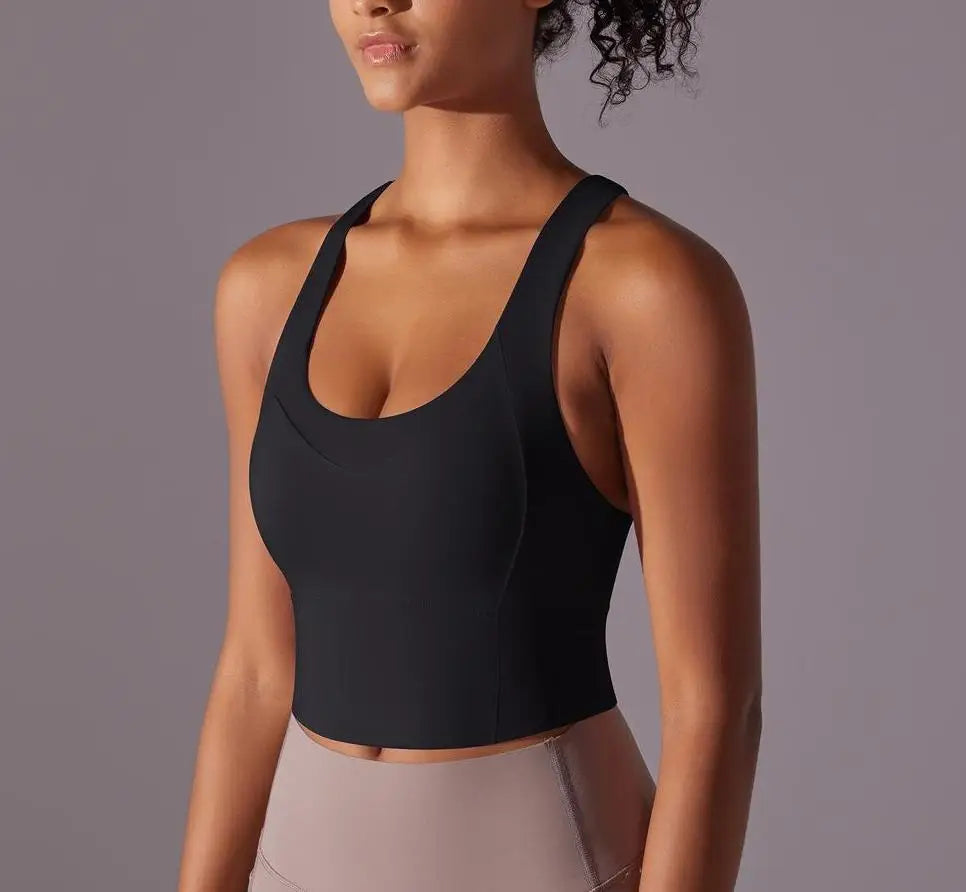 KiKis black seamless crossback sports bra for women with scoop neck and wide straps