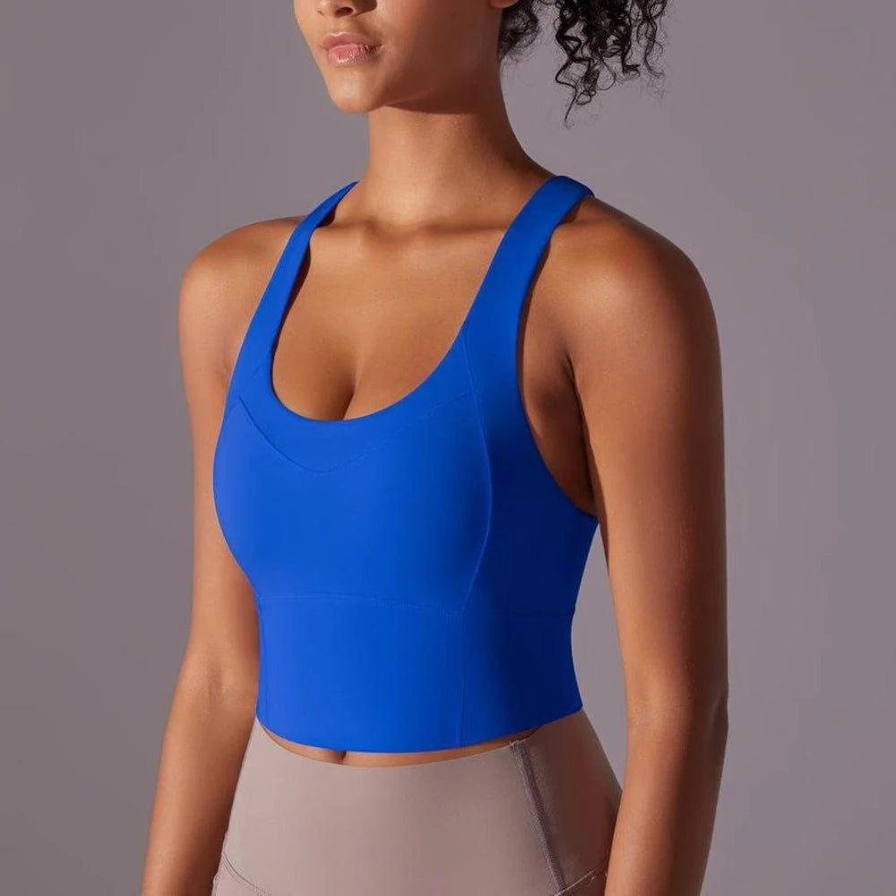 KiKis seamless crossback sports bra for women in bright blue with wide straps and scoop neckline