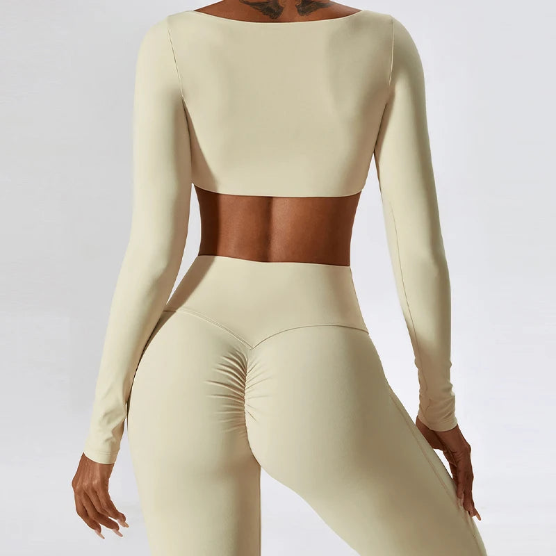 KiKis beige 2 piece workout set for women with long sleeves and ruched leggings back view