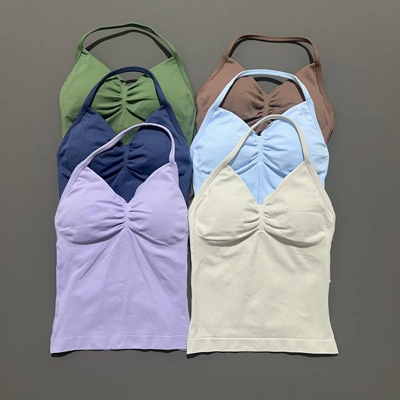 KiKis open back yoga tank top for women in multiple colors including green, brown, blue, purple, light blue, and cream