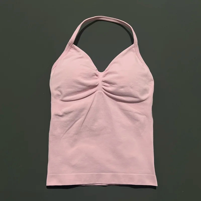 KiKis light pink open back yoga tank top for women with ruched front and halter neck design