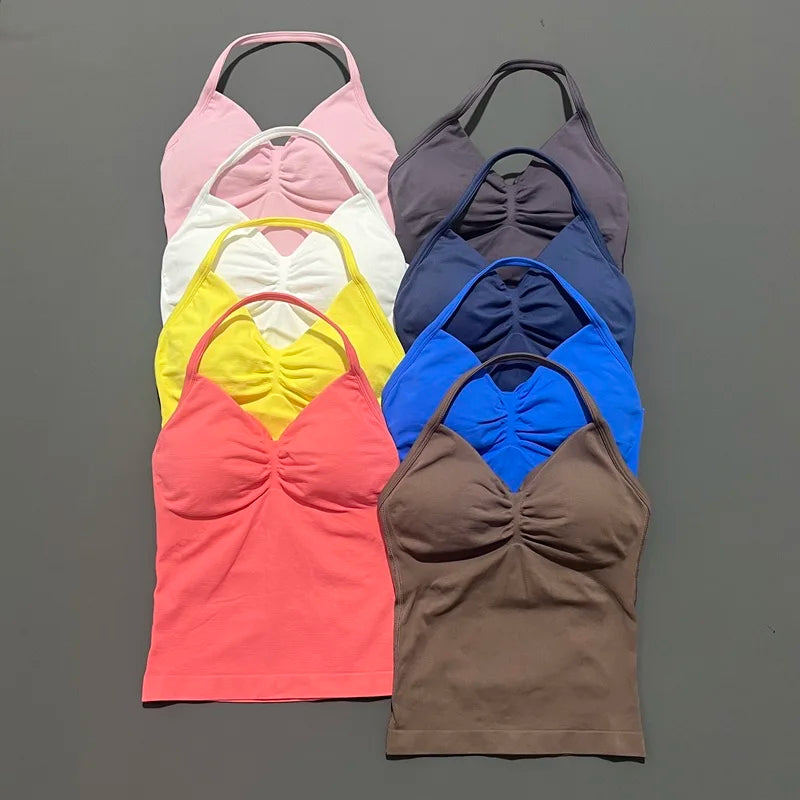 KiKis open back yoga tank top for women in multiple colors including pink, white, yellow, coral, brown, blue, navy, and purple