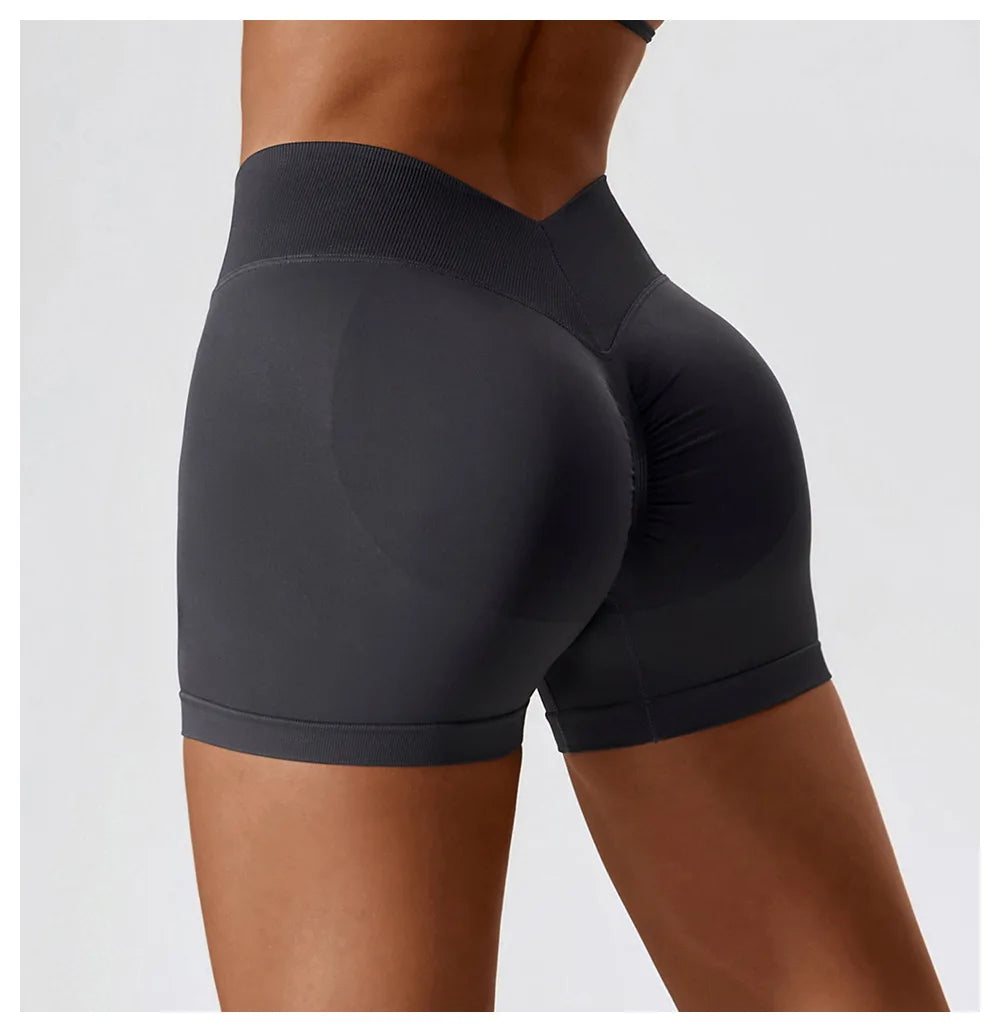 KiKis seamless scrunch butt gym shorts in black showing high waist and contoured fit