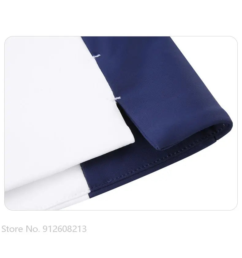 Close-up of navy and white fabric detail on women's golf windbreaker jacket by KiKis