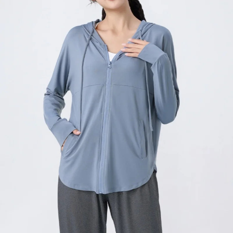 KiKis light blue zip-up hoodie with front pockets and drawstring hood for casual wear