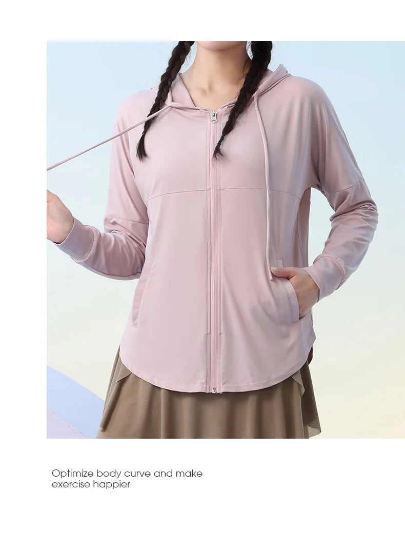 KiKis light pink zip-up hooded jacket with long sleeves designed for exercise and comfort