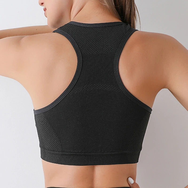 Back view of KiKis black push up sports bra for women with racerback design and textured fabric