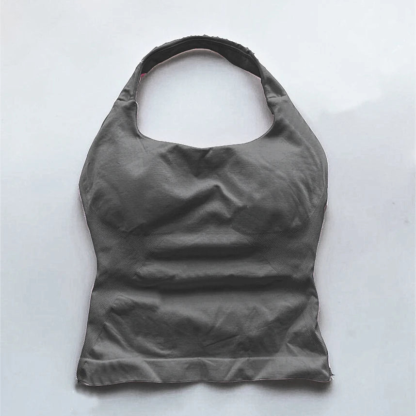 KiKis seamless backless sports tank top in black with a smooth, stretchy fabric and halter neck design