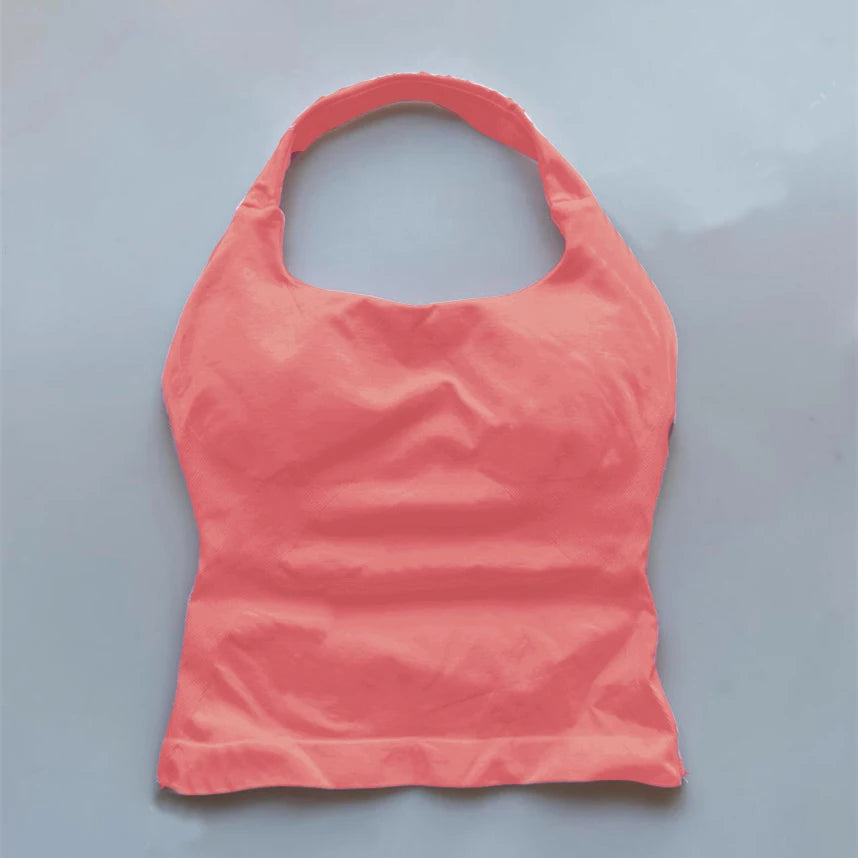 KiKis seamless backless sports tank top in coral pink with halter neck design