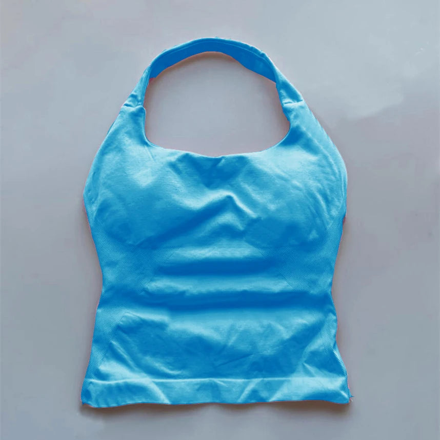 Blue seamless backless sports tank top laid flat showing front design and halter neck style