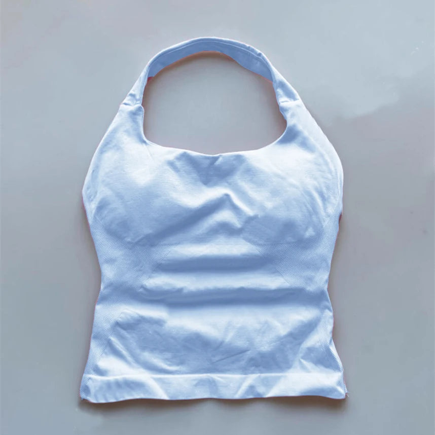 KiKis seamless backless sports tank top in white with halter neck design for activewear