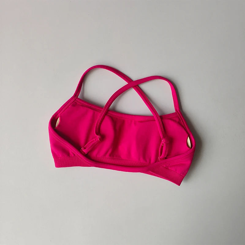 Pink seamless yoga suit for women sports bra with crisscross straps by KiKis