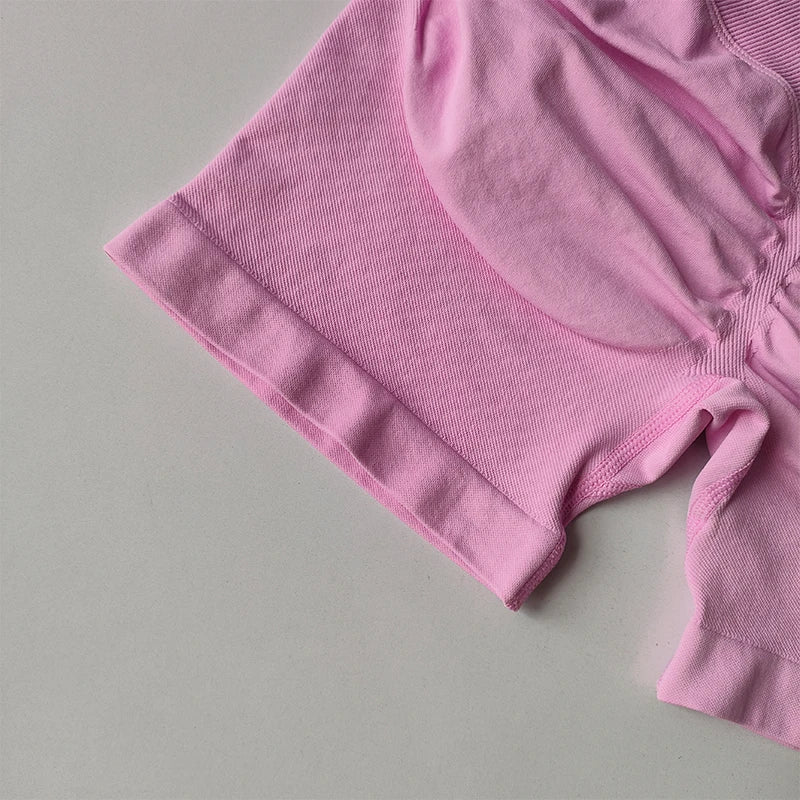 Close-up of pink seamless yoga suit for women shorts by KiKis showing fabric texture and stitching details