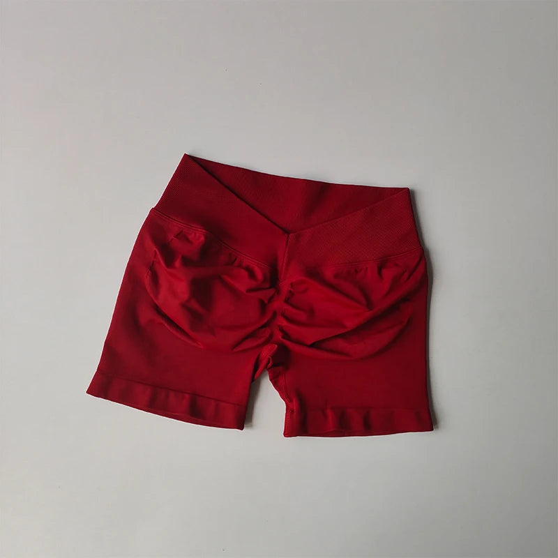 KiKis red seamless yoga suit for women shorts with high waistband and ruched back design