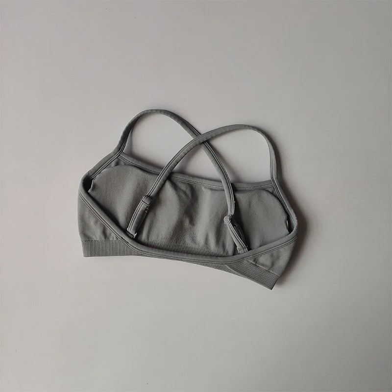 Gray seamless yoga suit for women top with adjustable crossed straps by KiKis