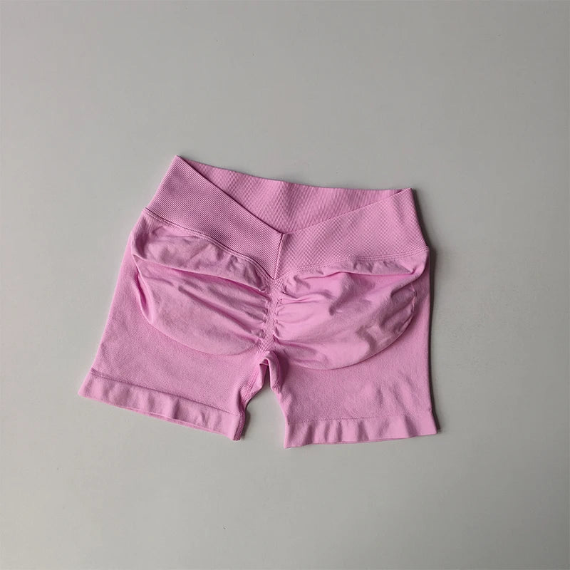 Pink seamless yoga suit for women shorts with ruched detailing and high waistband
