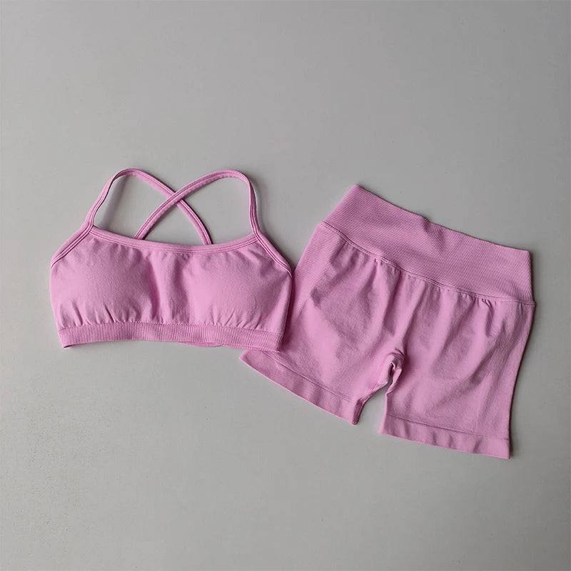 KiKis pink seamless yoga suit for women with cross-back sports bra and high-waist shorts