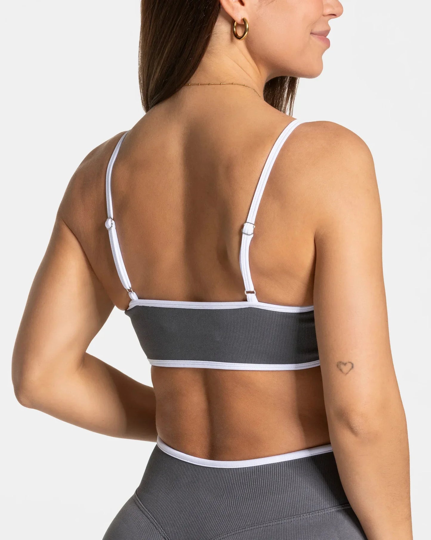 Back view of shockproof yoga bra outdoor fitness in gray with white trim adjustable straps