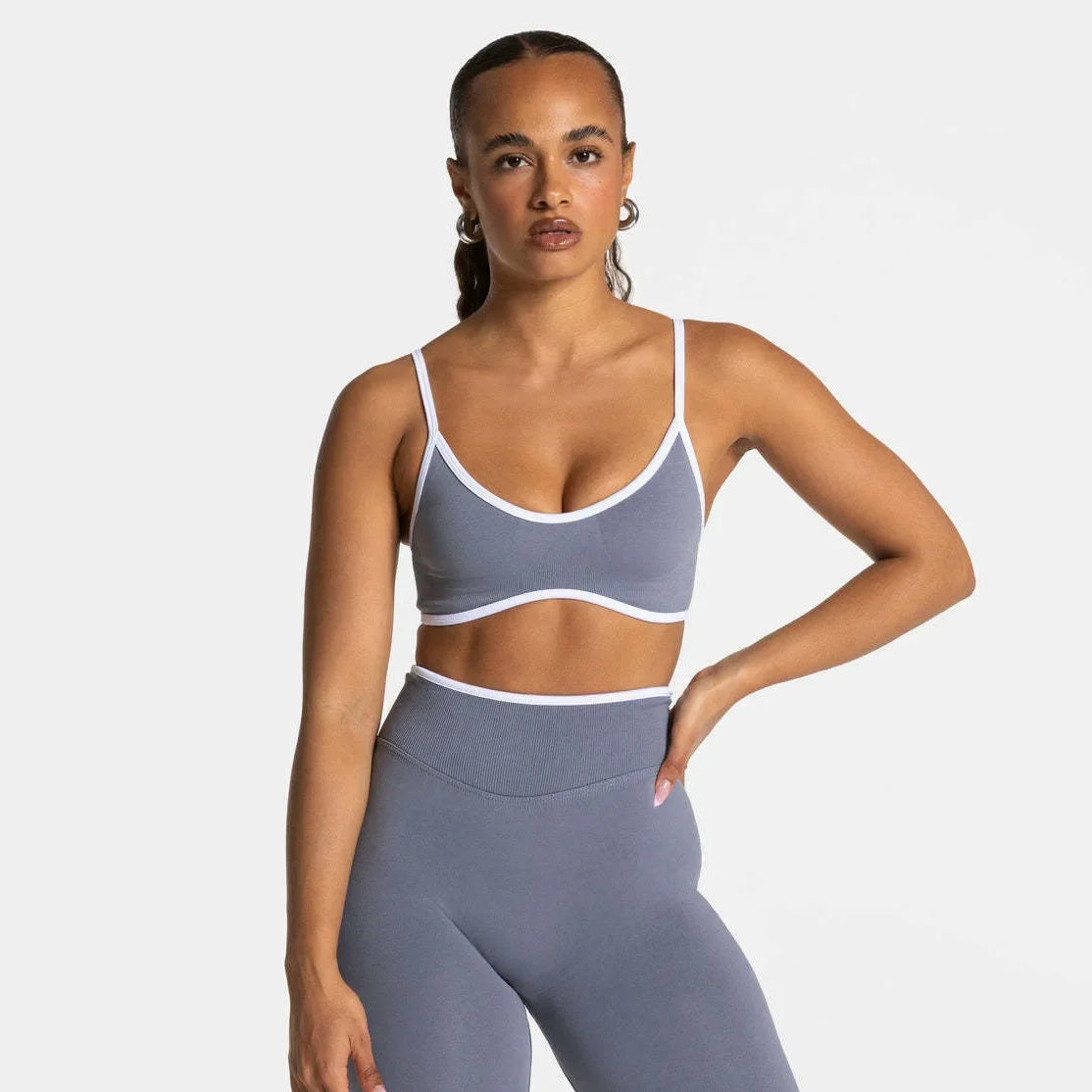 KiKis shockproof yoga bra outdoor fitness in gray with white trim worn by female model