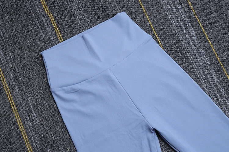 Light blue Womens Seamless Yoga pants by SOISOU with high waistband from KiKis on textured surface