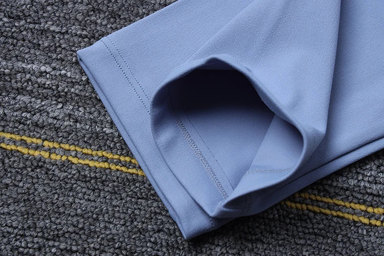 Close-up of light blue Womens Seamless Yoga pants by SOISOU showing fabric texture and stitching details