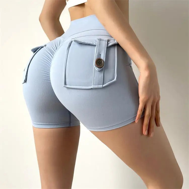KiKis high waisted cycling shorts women in light blue with buttoned back pockets and ruched detailing