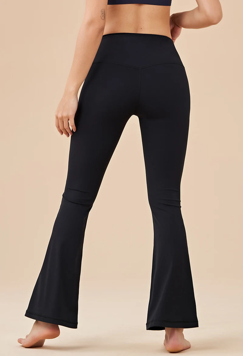 KiKis Womens Bell bottom yoga pants in black with high waist and flared legs