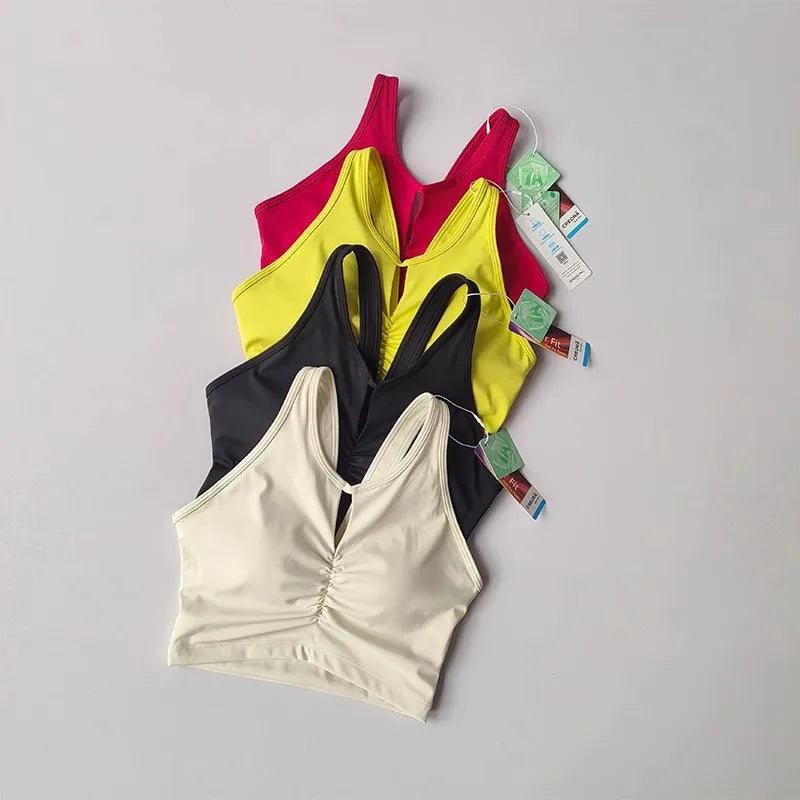 KiKis women's push up sports bra set in red yellow black and white with ruched front detail
