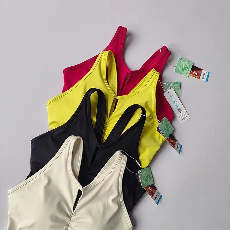 KiKis women's push up sports bra in multiple colors including red, yellow, black, and cream