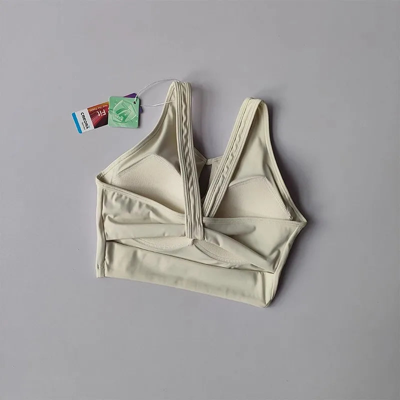 KiKis women's push up sports bra in beige with thick supportive straps and padded cups