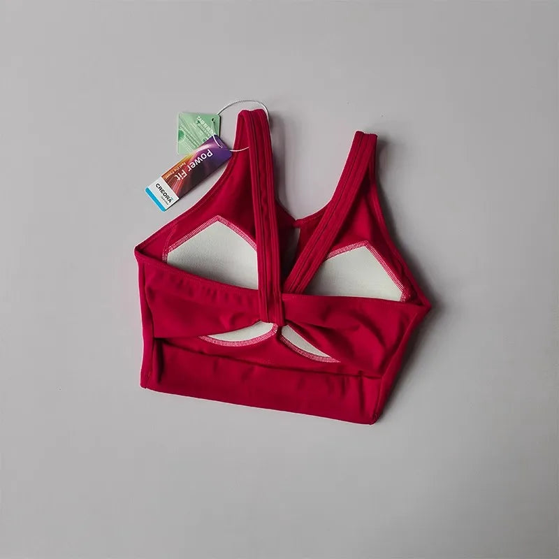 KiKis women's push up sports bra in red with padded support and racerback design