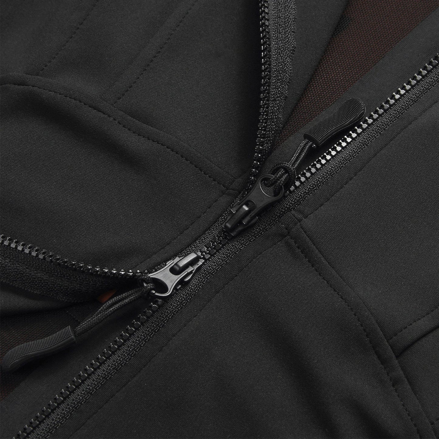 Close-up of black zipper detail on stylish summer motorcycle jacket for women by KiKis