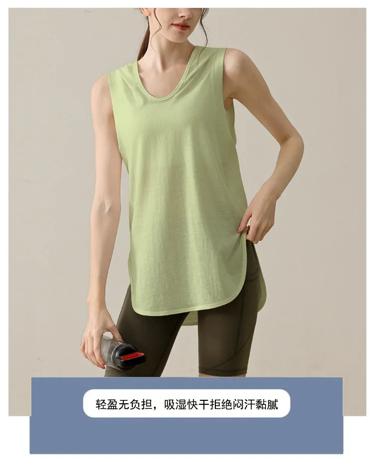 KiKis light green summer sleeveless workout hoodie worn by woman with athletic leggings