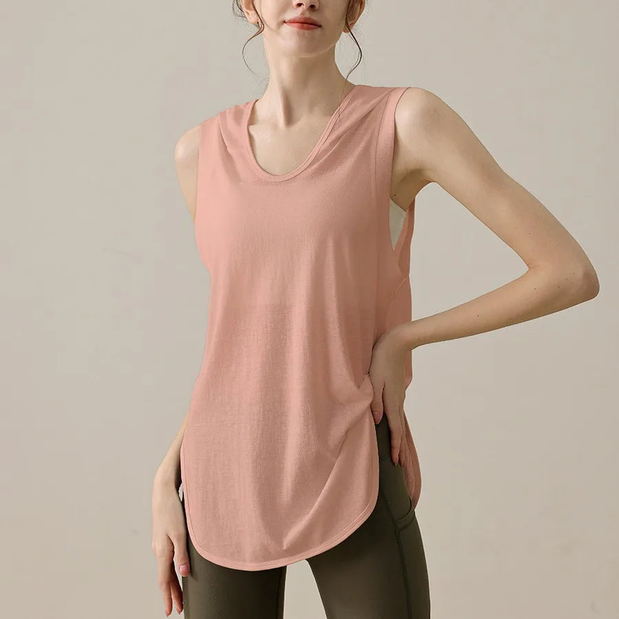 KiKis summer sleeveless workout hoodie in soft pink with rounded hem and relaxed fit