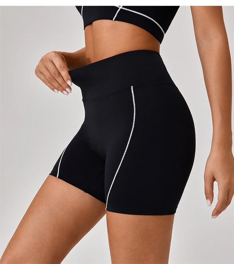 KiKis women's nude fitness shorts set in black with high waist and white seam detailing