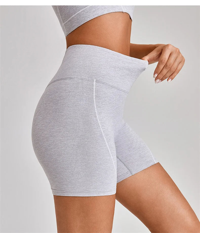 KiKis women's nude fitness shorts set in light gray with high waist and stretchy fabric