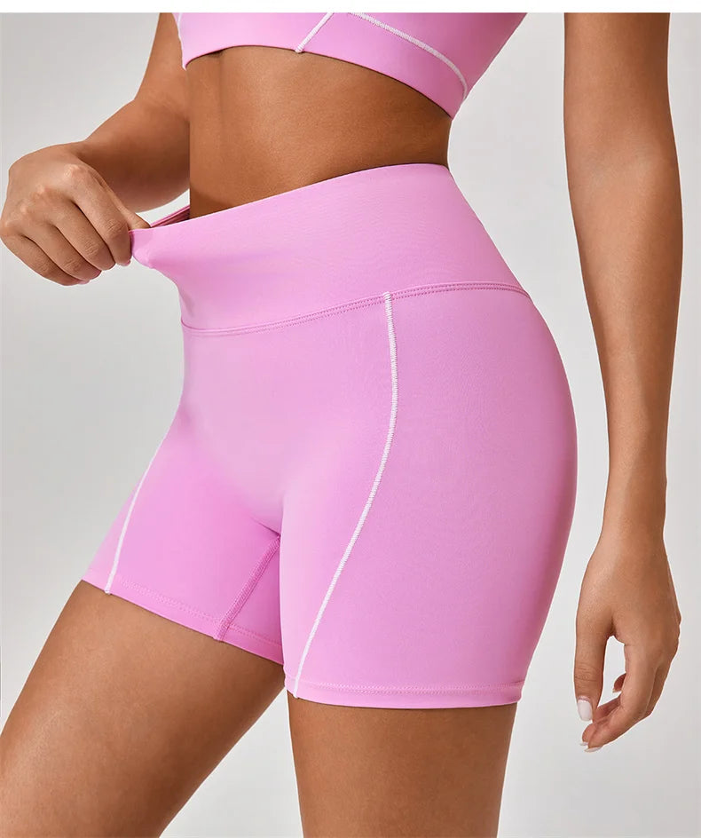 KiKis women's nude fitness shorts set in pink with high waist and white stitching detail