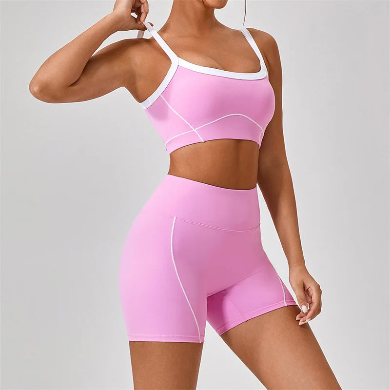 KiKis women's nude fitness shorts set in light pink soft fabric with white trim and slim fit design