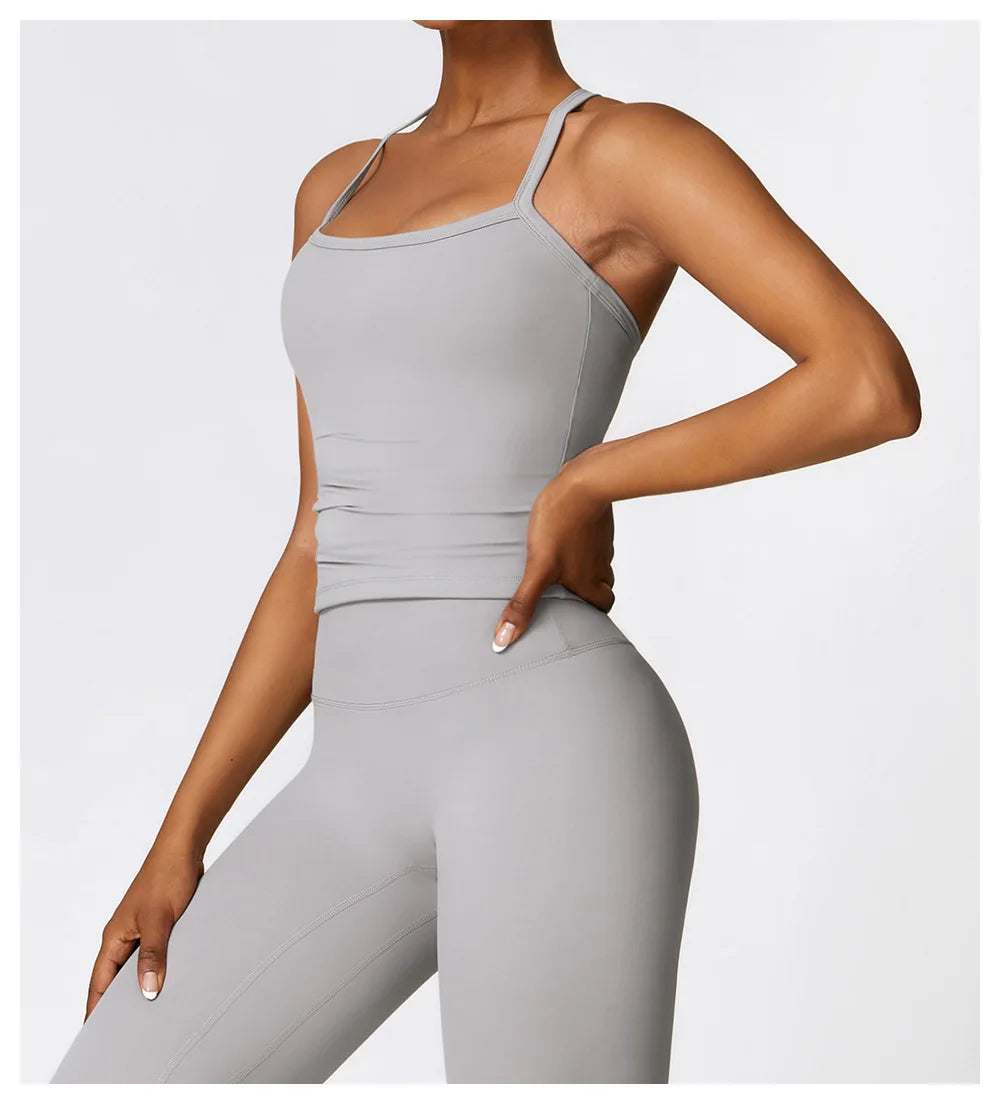 KiKis breathable gym workout bra for women in light gray worn with matching leggings