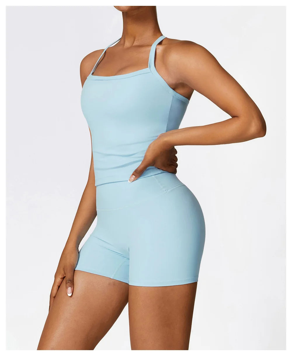 KiKis light blue breathable gym workout bra for women with thin straps and matching high-waisted shorts