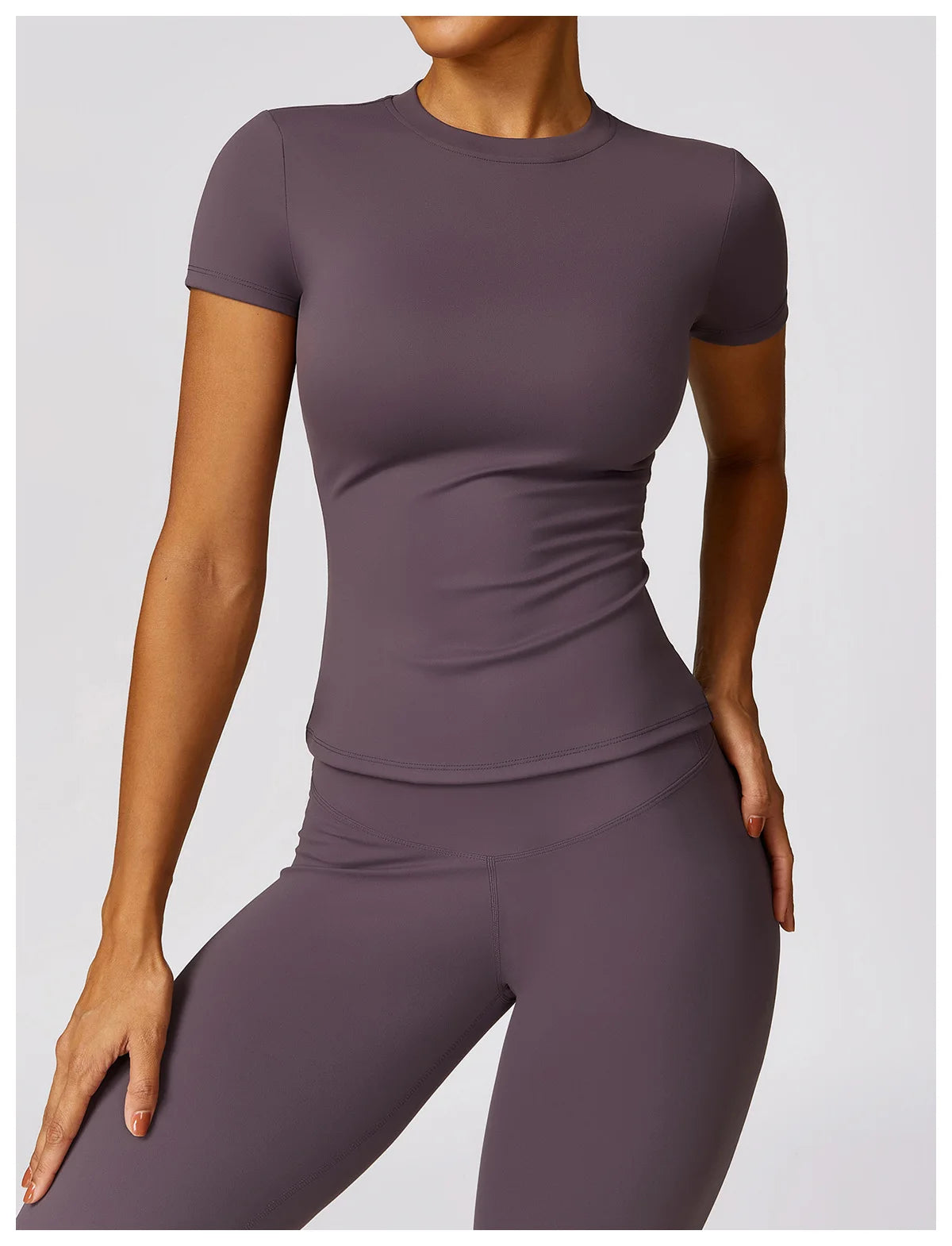 KiKis seamless yoga top for women in purple short sleeve fitted style