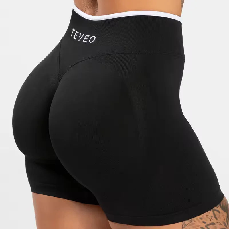 KiKis women's seamless high waist gym shorts in black with white trim and TEYEO logo