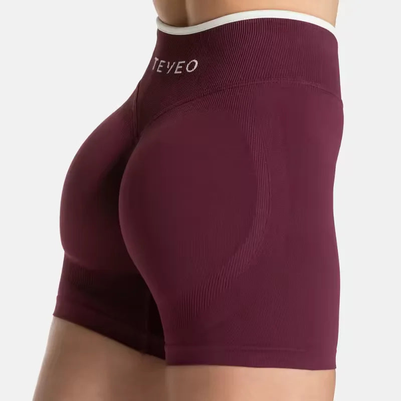 KiKis women's seamless high waist gym shorts in burgundy with contour design for a snug fit