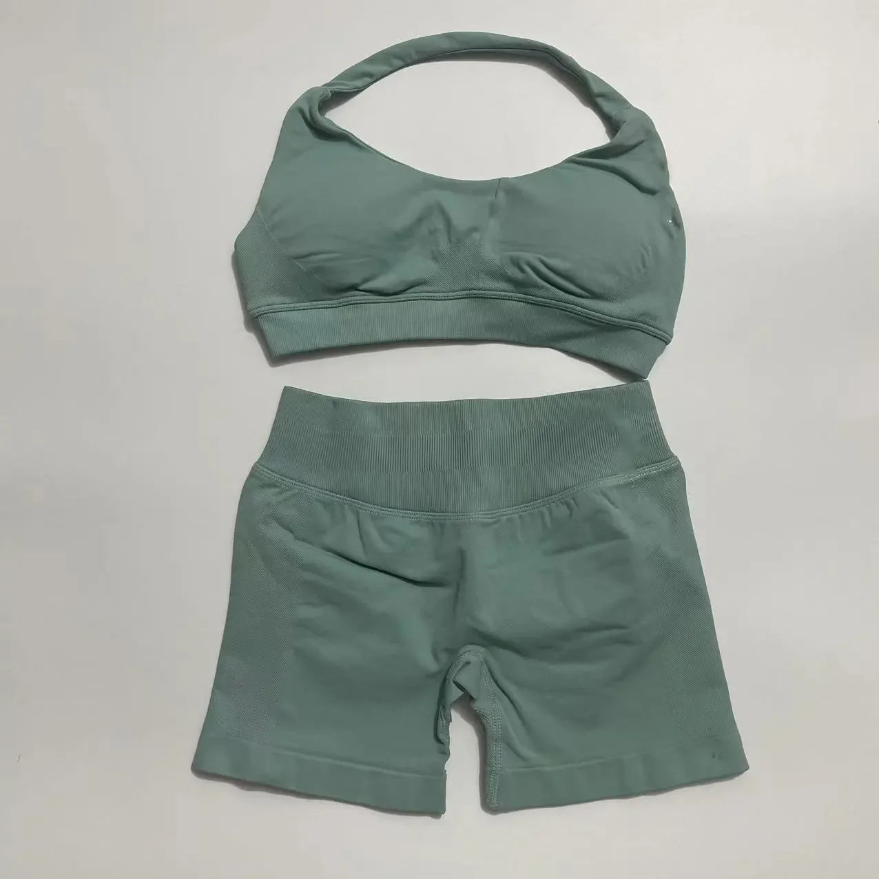 KiKis seamless fitness yoga set for women in sage green with a halter top and high-waisted shorts