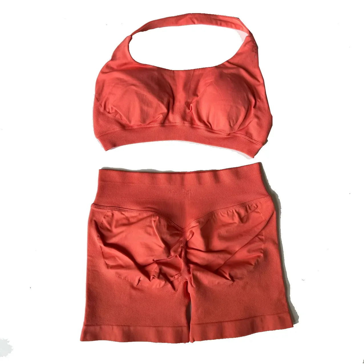 KiKis seamless fitness yoga set for women in coral with sports bra and high-waisted shorts