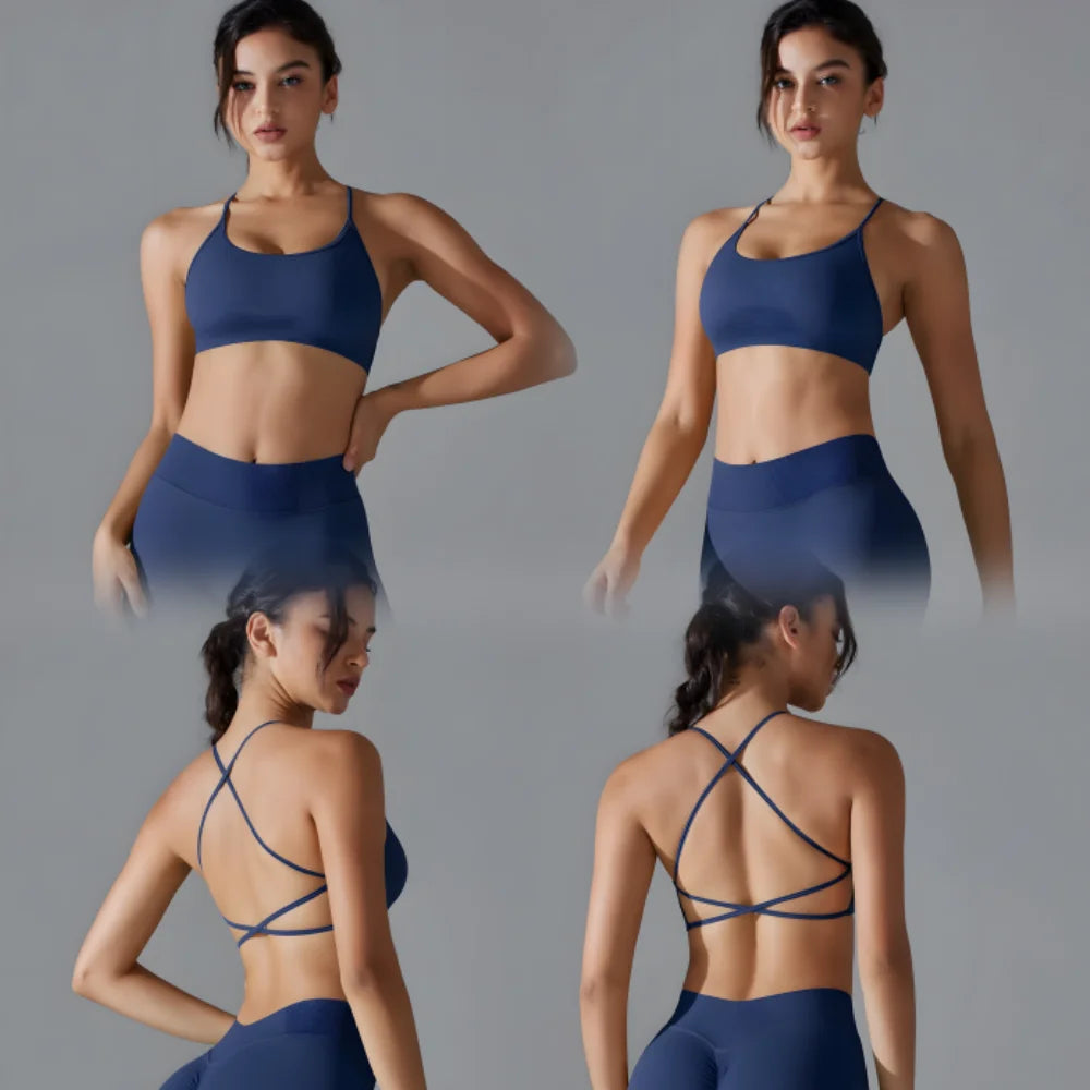 KiKis women's seamless sports bra in navy blue shown from front and back with crisscross straps